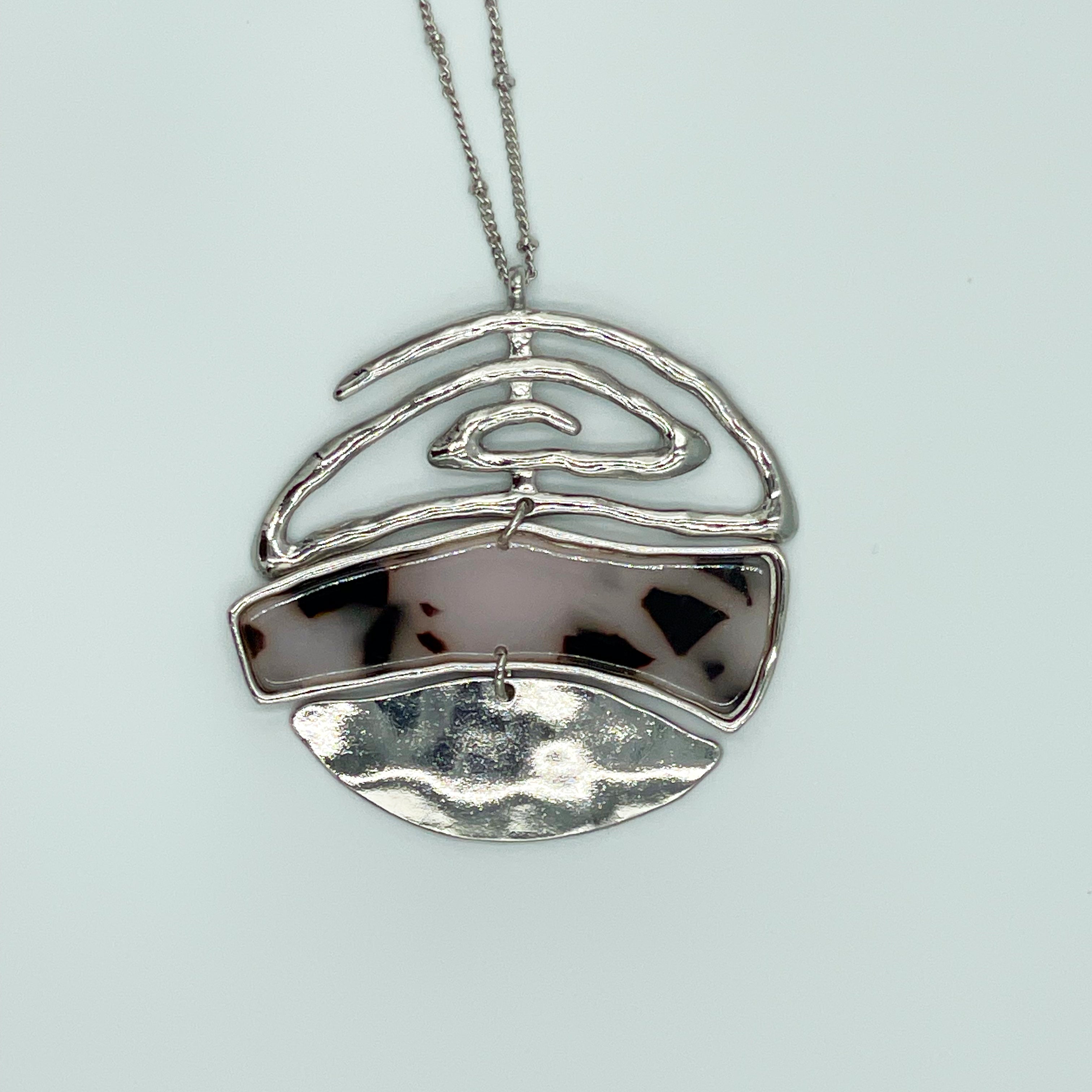 Silver-toned Pendant Necklace and Earring Set Swirl Round