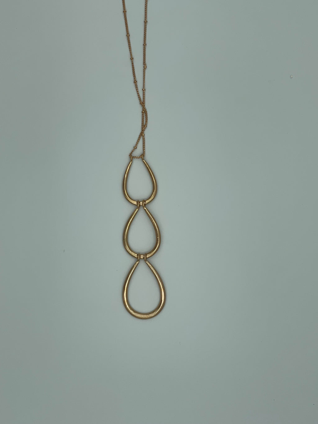 Gold-toned w\Interlocking Teardrop Pendant